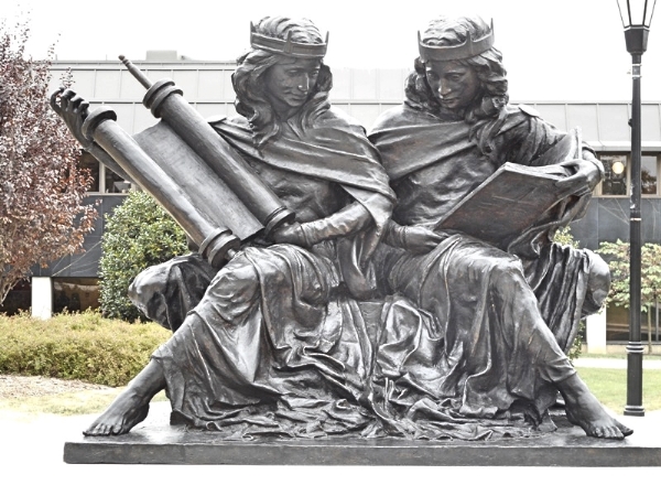The "Synagoga and Ecclesia in Our Time" sculpture by Joshua Koffman is seen on the campus of St. Joseph's University in Philadelphia. The sculpture shows Synagoga (Synagogue) and Ecclesia (Church) studying their sacred texts together. (CNS photo/courtesy St. Joseph's University)